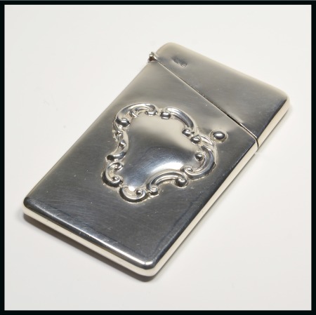 Stamp of Stamp Boxes Group of three silver items incl. 1902 Chester silver card holder with hinged lid at top, 1925 Birmingham silver cigarette case, etc.