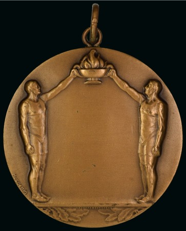 1940ca. Bronze medal by Huguenin, 40mm, depicting two athletes holding up a flame, blank reverse