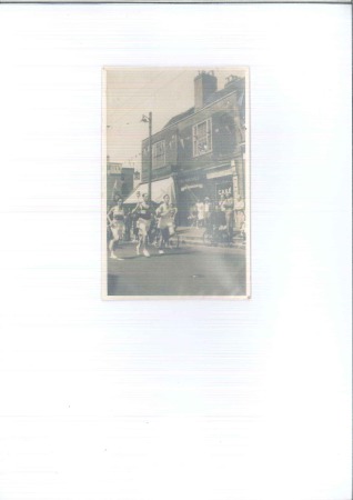 1948 London group incl. photo postcard of the Olympic Torch passing through Uxbridge High Street