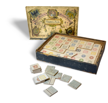 Stamp of Large Lots and Collections THE EARLIEST RECORDED PHILATELIC GAME: 1868ca. Memory game of about 210 wooden pieces featuring reproductions of stamps
