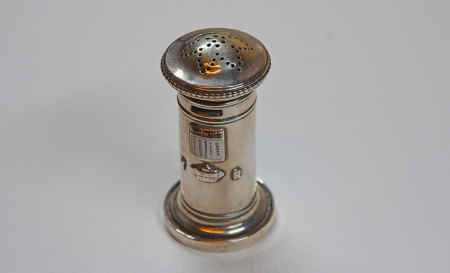 1894 Silver salt/pepper shaker in the form of a postbox, 76mm tall, showing enamelled sign in red and white with "V (Crown) R" below